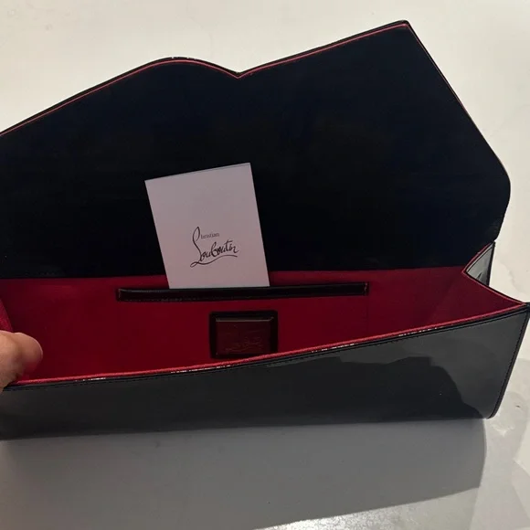 Christian Louboutin Glossy Black and Vibrant Red Clutch - Picture 1 of 3